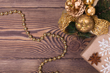 Christmas and New Year holiday background. Christmas decor on a wooden table. Flat lay, copy space