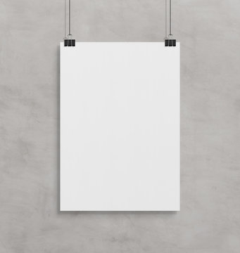 Blank white poster hanging up with clips mockup