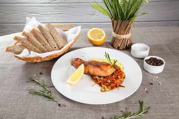 Grilled salmon steak slices