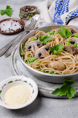 Dark pasta with mushrooms