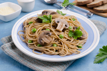 Dark pasta with mushrooms