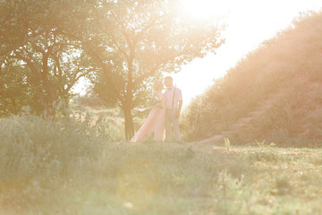 wedding couple on the nature in summer day.