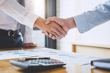 Business team greeting and finishing up a meeting, Two Business handshake of collaboration after...