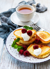 Delicious pancakes with raspberries