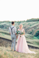 Fototapeta premium wedding couple on the nature in summer day.
