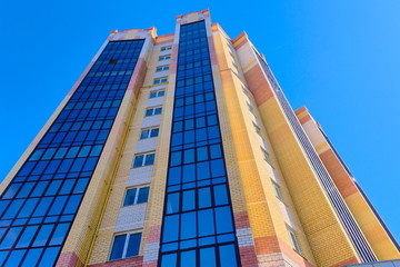 Multi-storey building stretches to the sky.