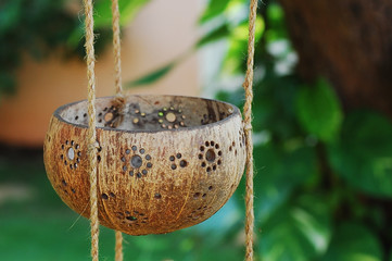 hanging coconut candlestick