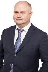 Adult bald man in a suit isolated on white background