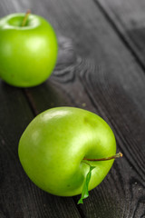 green apple on wooden background