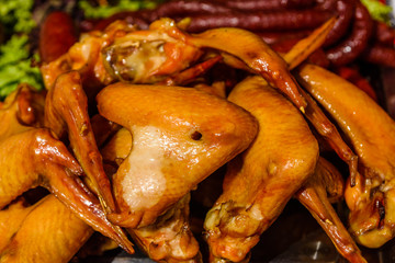 Heap of the fresh smoked chicken wings