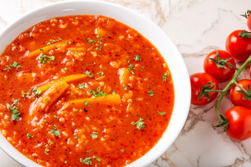 Cream soup made from tomatoes, rice and carrot