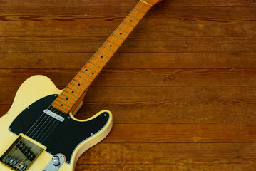 Fototapeta na wymiar Vintage Electric Guitar on a Wooden Floor