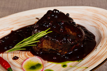 Baked beef in pepper sauce
