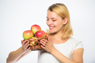 Major portion of your meals will comprise of apple. Girl hold basket with apples white background. Metabolism and dieting. Healthy nutrition concept. Woman knows how stay in shape and be healthy