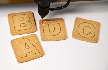 Industrial laser engraving letter D