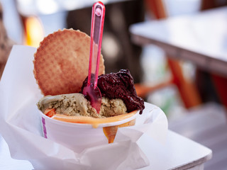 Italian ice cream gelato in street café in Syracuse, Sicily, Italy