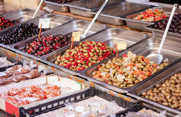 Green and black olives in the fruit market, Catania, Sicily, Italy