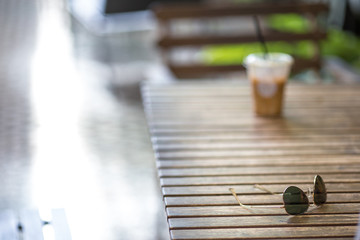 Close proximity to the chair, stylish design and a variety of useful, such as, coffee mug, glasses or drinks, from the coffee shop, bakery.