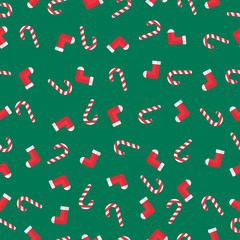 X'mas things seamless pattern gift wrap paper. Candy cane, sock. Green rectangle background. Flat style. 