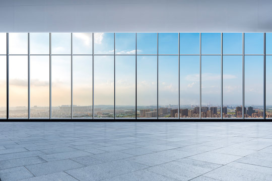 Fototapeta Panoramic skyline and buildings from glass window