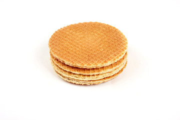 Dutch waffle called a stroopwafel isolated on a white background.