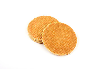 Dutch waffle called a stroopwafel isolated on a white background.
