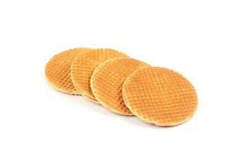 Dutch waffle called a stroopwafel isolated on a white background.