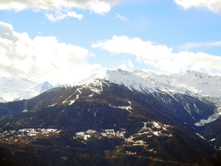 Alps in Switzerland, st Moritz. Beautiful peaks covered with snow. Place with luxury resorts.