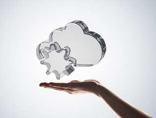 Cloud computing concept with glass symbol shown in hand