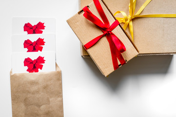 concept of gift cards on white background top view