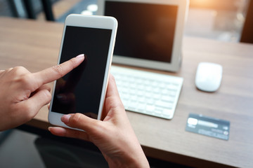 businesswoman hands using table and cell phone