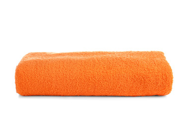 Bright folded towel on white background