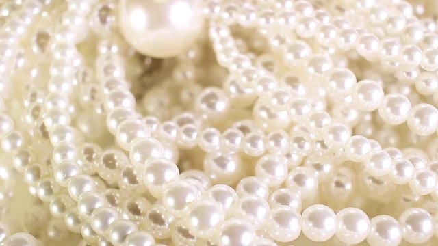 White pearl perarls as background. Jewel,jewelry.