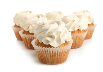 Sweet cupcakes on white background