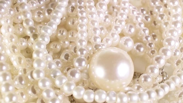 White pearl perarls as background. Jewel,jewelry.