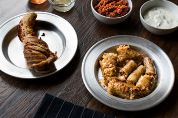 Turkish Food Minced Meat and Rice Stuffed Tripe Mumbar Dolma with Sirdan / Shirdan Dolmasi.