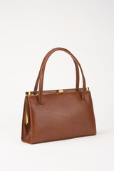 BROWN LADIES LEATHER HANDBAG ISOLATED ON WHITE BACKGROUND