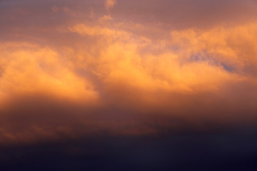 RED AND ORANGE CLOUDS AT SUNSET