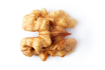Close up of walnut kernels isolated on white background