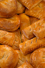 SELCTION OF SAVOURY PASTIES AND SAUSAGE ROLLS IN BAKERY