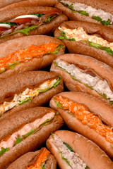 SELECTION OF SALAD SANDWICHES IN BREAD ROLLS
