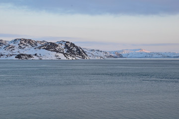 winter landscape with mountains and sea