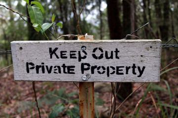 Keep Out private property sign in black and white.
