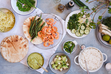 Grilled Prawn Shrimp Fajitas taco tortillas brussels sprout asparagus, on dinner table party overhead 
