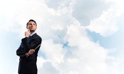 Inspiration of young creative businessman