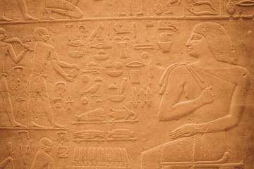 Egyptian Hieroglyphic carvings on the exterior walls of an ancient temple