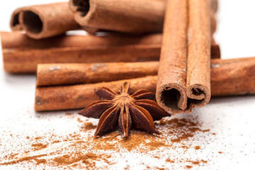 Cinnamon sticks and star anise isolated on white background