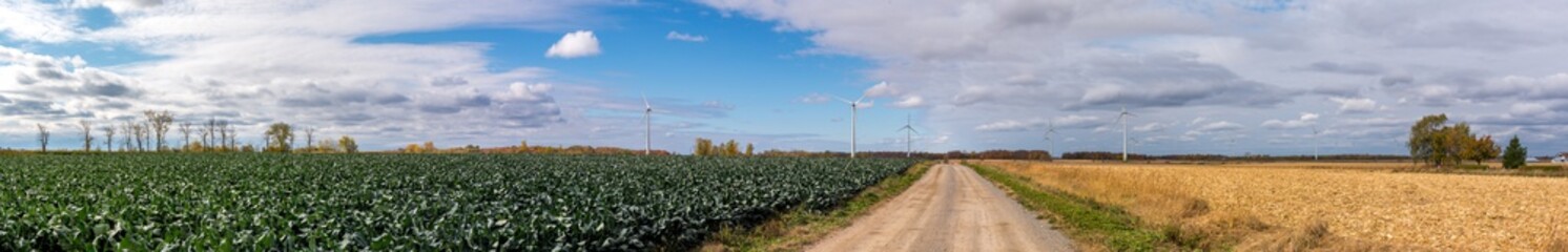 Panoramic view of wind turbine in Quebec agricultural area at late fall