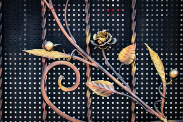 wrought-iron gates, ornamental forging, forged elements close-up