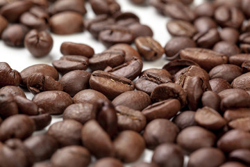 Pile coffee beans isolated on white background